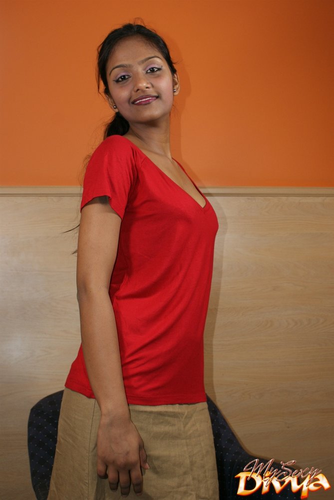 Divya Indian Porn Stars - Divya in red top and brown skirt teasing her fan licking ...